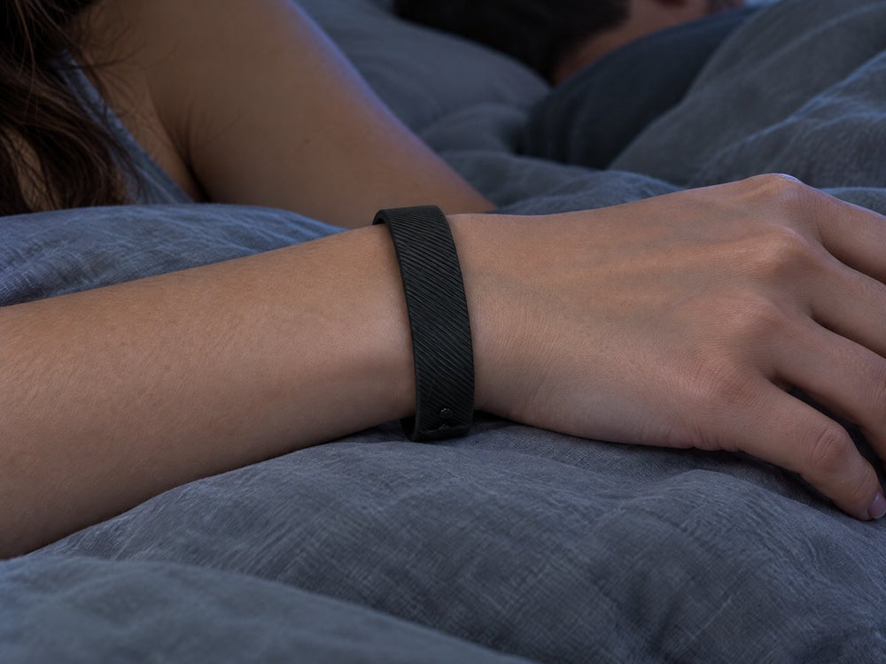 Sleeping with Dawn Wake Band on the wrist while a partner sleeps