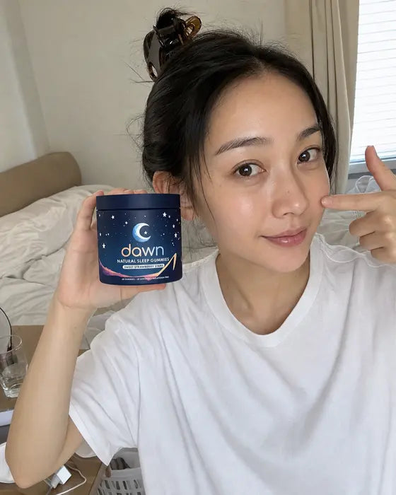 Customer holding Dawn jar showing results