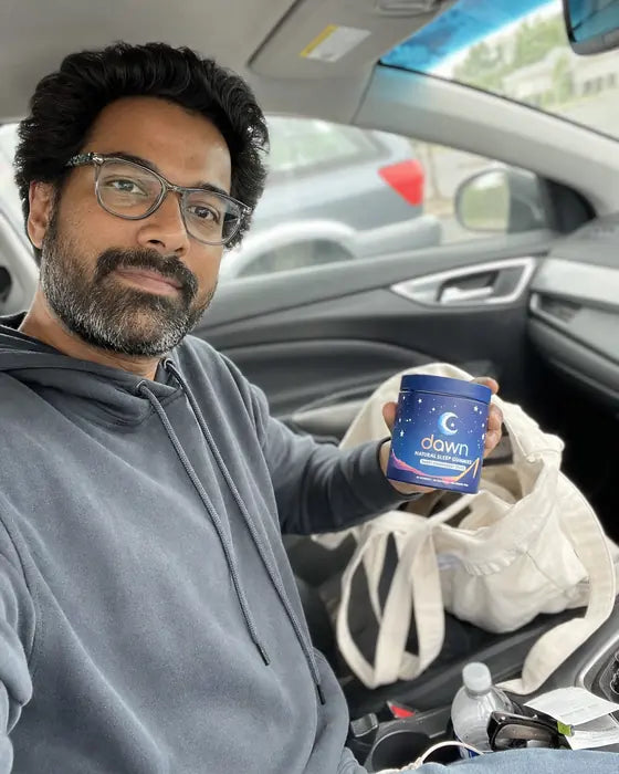 Dawn jar being pulled from tote bag in car